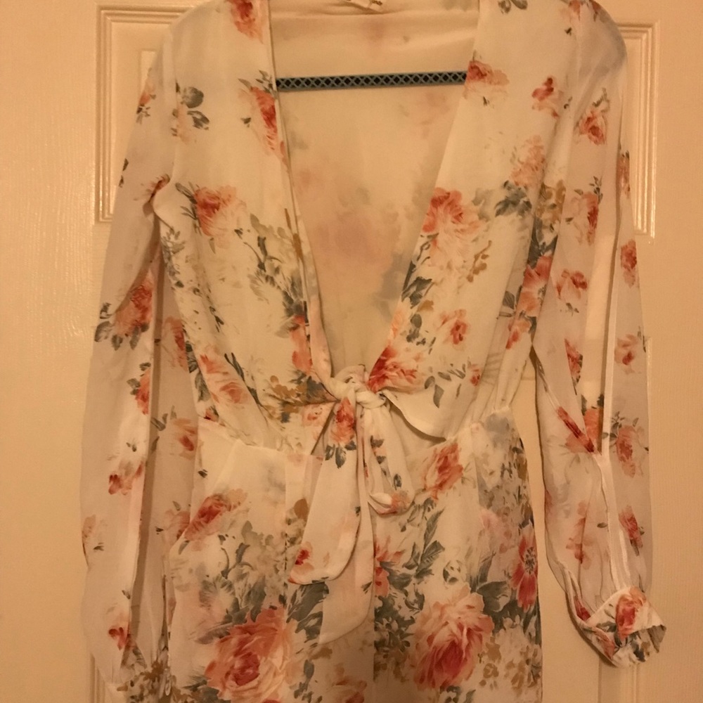 Floral Peekaboo sleeve jumpsuit!